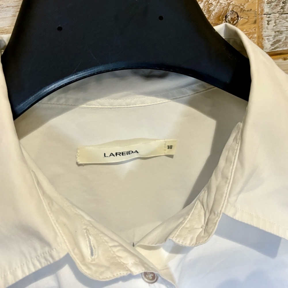 Woman’s Crisp White Lis Lareida Shirt with Modern Collar